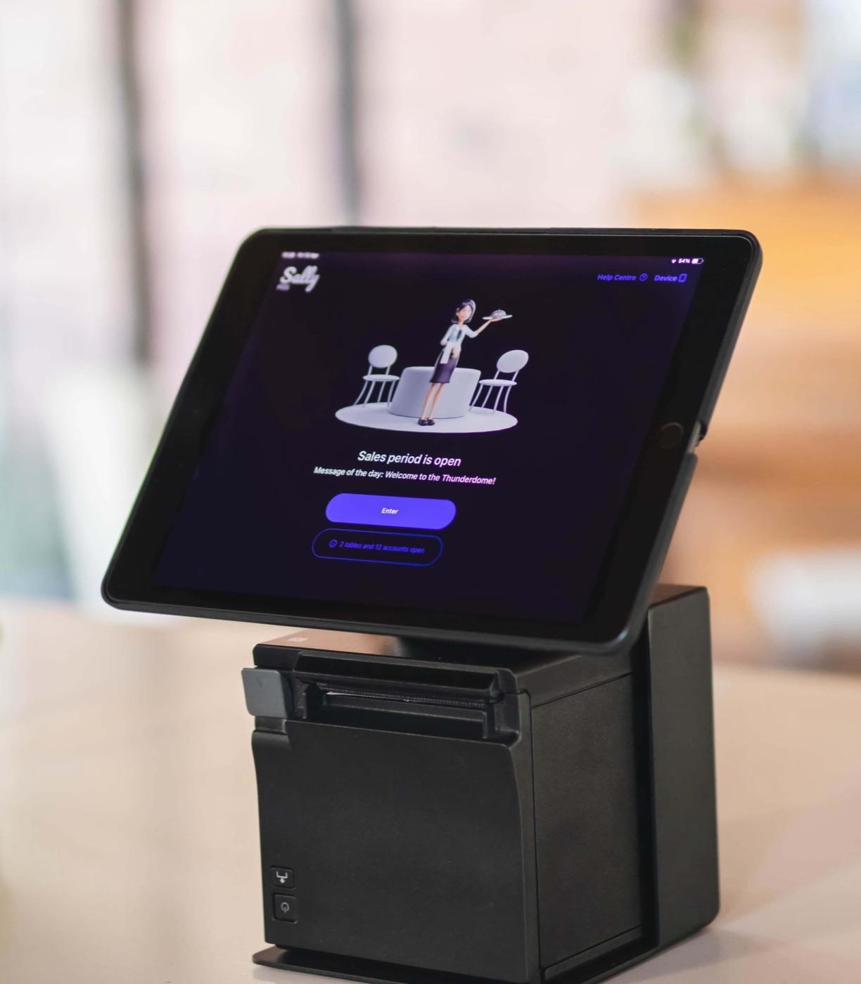 Sally POS on a tablet stand with a receipt printer
